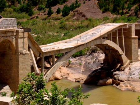 Old bridge destroyed by forces loyal to the opposition.